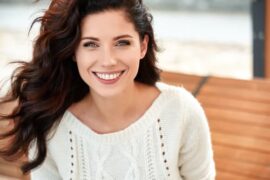 young woman smiling at camera