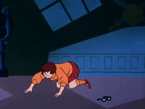 Velma looking for her glasses GIF